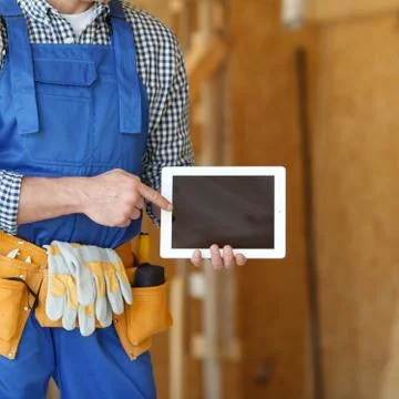 Worker using digital tablet Stock Photos