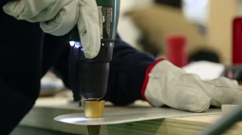 Worker using drill with conical drill to enlarge hole Video stock 64119509