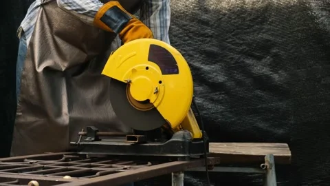 Worker using electric grinder machine cutting steel. Stock Footage 134166795