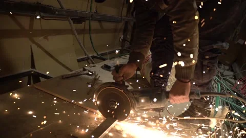Worker Using an Electric Saw, Slow Motion Stock Footage 167266475