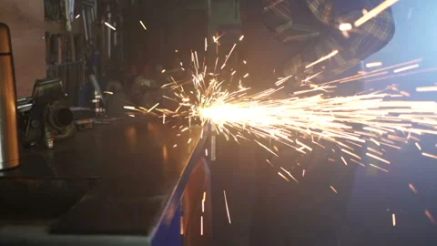 Worker using grinder tool and working with metal.  Video stock 124048477