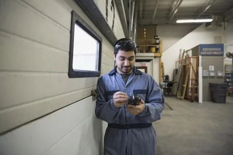 Worker using handheld bar code reader Stock Photos