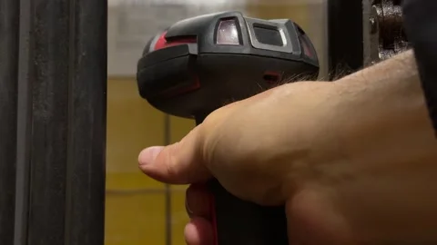 Worker using handheld device to scan inventory at local warehouse during Stock Footage 316682835