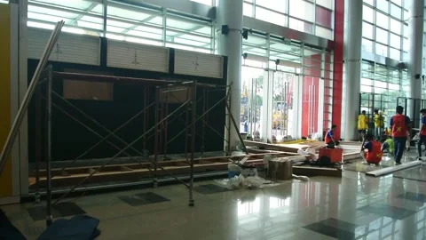 Worker using high-rise skyscraper in exhibition area 스톡 동영상 290851171