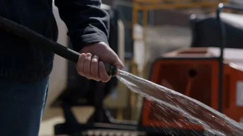 Worker Using a Hose Stock Footage 85637746