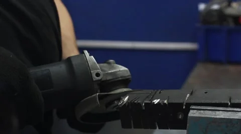 Worker using industrial grinder. Stock Footage 48788116