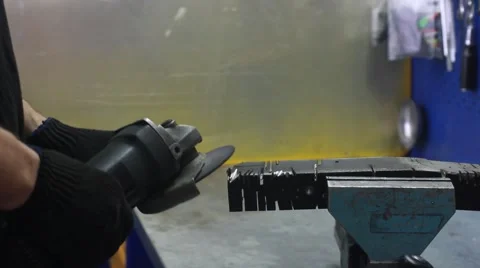 Worker using industrial grinder. Stock Footage 48788123