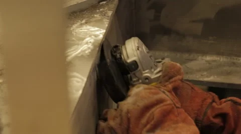 Worker Using Industrial Grinder Video stock 63044537