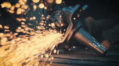 Worker using industrial grinder Stock-Footage 65411620