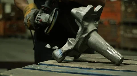 Worker using industrial grinder Stock-Footage 65411861