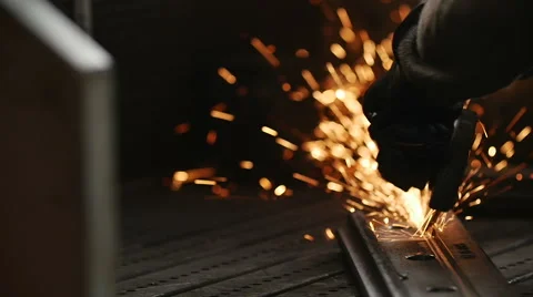 Worker using industrial grinder on metal rail track parts Stock-Footage 62441209