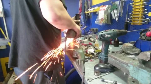 Worker using industrial grinder. Tool on metal grind metal product. Stock Footage 51167444