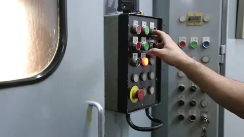 Worker Using Machine Control Buttons Stock Footage 340107937