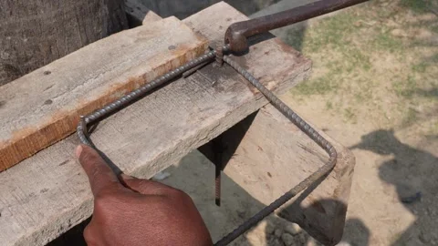 Worker Using Manual Rebar Bender Steel Rod Stock Footage 332575407
