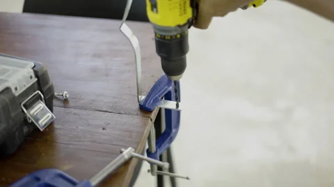 Worker Using Power Drill On Steel Surface Stock Footage 337356348