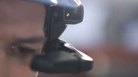Worker using smart augmented reality goggle device in industrial hall company Stock Footage 149296131