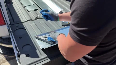 Worker Using Speed Square to Measure on Job Site Video stock 304006136