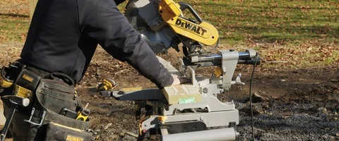 Worker Using a Table Saw to Cut Wood (6K) Stock Footage 120410835