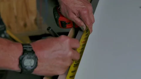 Worker Using a Tape Measure Stock Footage 201964996