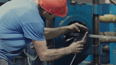 Worker using a Vernier Caliper measurement of rebar Stock Footage 121189276