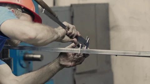 Worker using a Vernier Caliper measurement of rebar Video stock 121193134