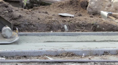 Worker Using Vibrating Machine Video stock 60982761