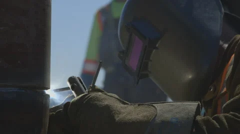 Worker using a welding torch - close up Stock Footage 65053014