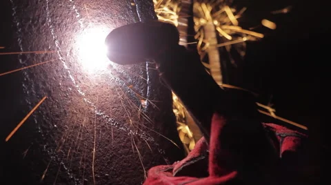 Worker Using a Welding Torch to cut Metal Stock Footage 63873355