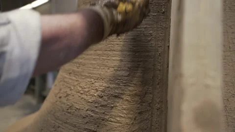 Worker Using Wooden Template to Shape a Traditional Clay Bell Mold. Stock Footage 221425454