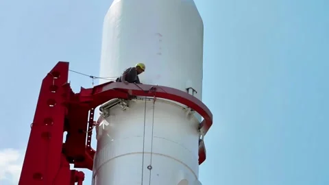 Worker on "Vostok" Rocket at Launch Pad: High-Altitude Work Stock Footage 314160234