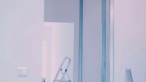 Worker is walking around the room Stock Footage 77350596