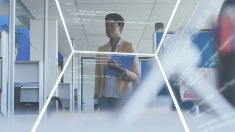 Worker walking with blue folder to desk while wireframe appearing and code Stock Footage 333720447