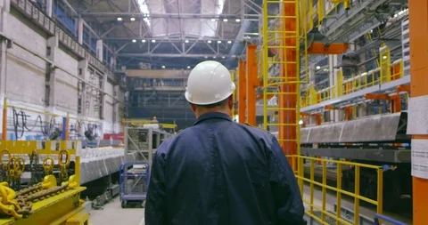 A worker is walking in the plant Stock Footage 99314387