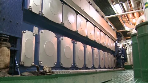 Worker walking in ship engine room slow motion Stock Footage 102629079