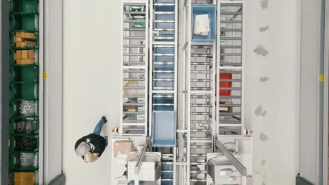 Worker Walking Through Automated Warehouse, Overhead Ceiling Shot Stock-Footage 342316314
