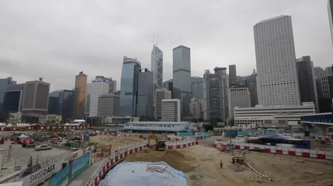 A worker walks at a construction site in Hong Kong Central Stock Footage 45135236