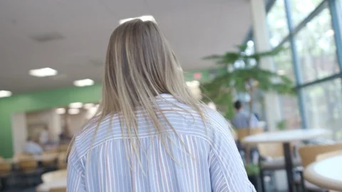 Worker Walks Through Modern Office Cafe Stock Footage 122934993
