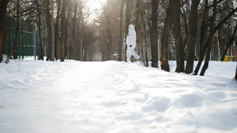 A worker walks through the woods in a covid protective suit. Video stock 168868196