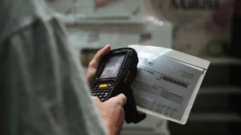 Worker In Warehouse Checking Order Stock Footage 71986561