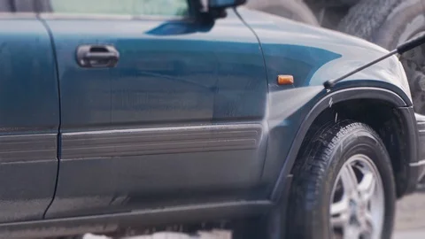 The worker washes the car thoroughly close-up Stock Footage 104149550