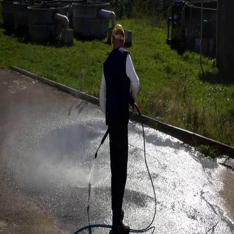 Worker washing the industrial premises Stock Footage 69737191