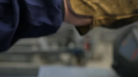 Worker wearing mittens Stock Footage 94042237