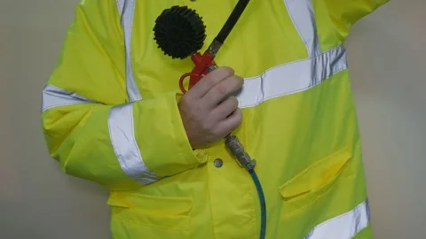 Worker Wearing Reflective Uniform Blowing Air Stock Footage 220016767