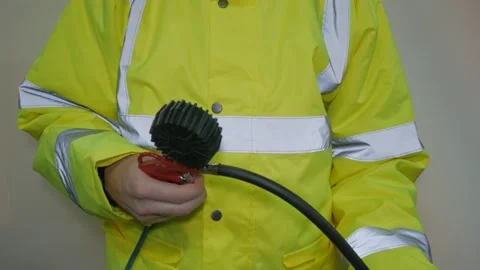Worker Wearing Reflective Uniform Blowing Air 库存影片 220016777