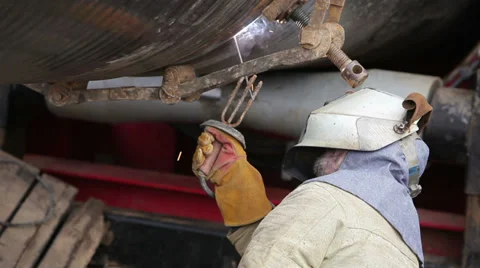 Worker is welding and examine the pipe Stockbeeldmateriaal 36167338