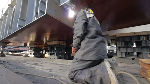 Worker welding in a factory. Stock Footage 33905163