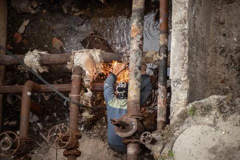 Worker with a welding machine Stock Photos