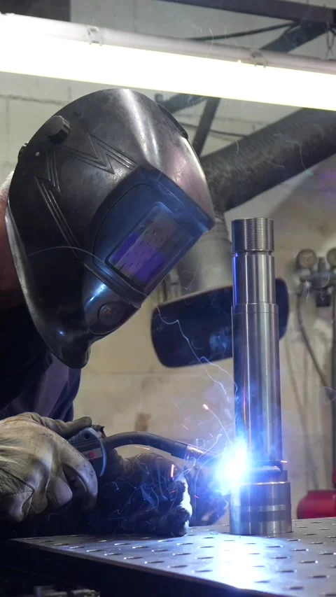 Worker welding in a metal factory alone Stock Footage 293320754