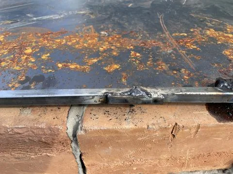 Worker welding metal structure at construction site Stock Photos