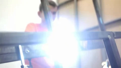 Worker welding metal with welding machine Stock-Footage 128928967